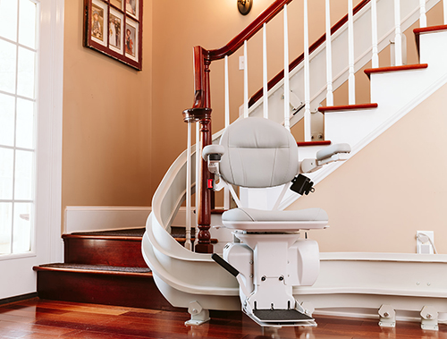Bruno Elite Custom Curved Stair Lift fits the unique turns of this staircase