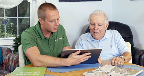Mobility Consultant showing product information via the tablet to the customer
